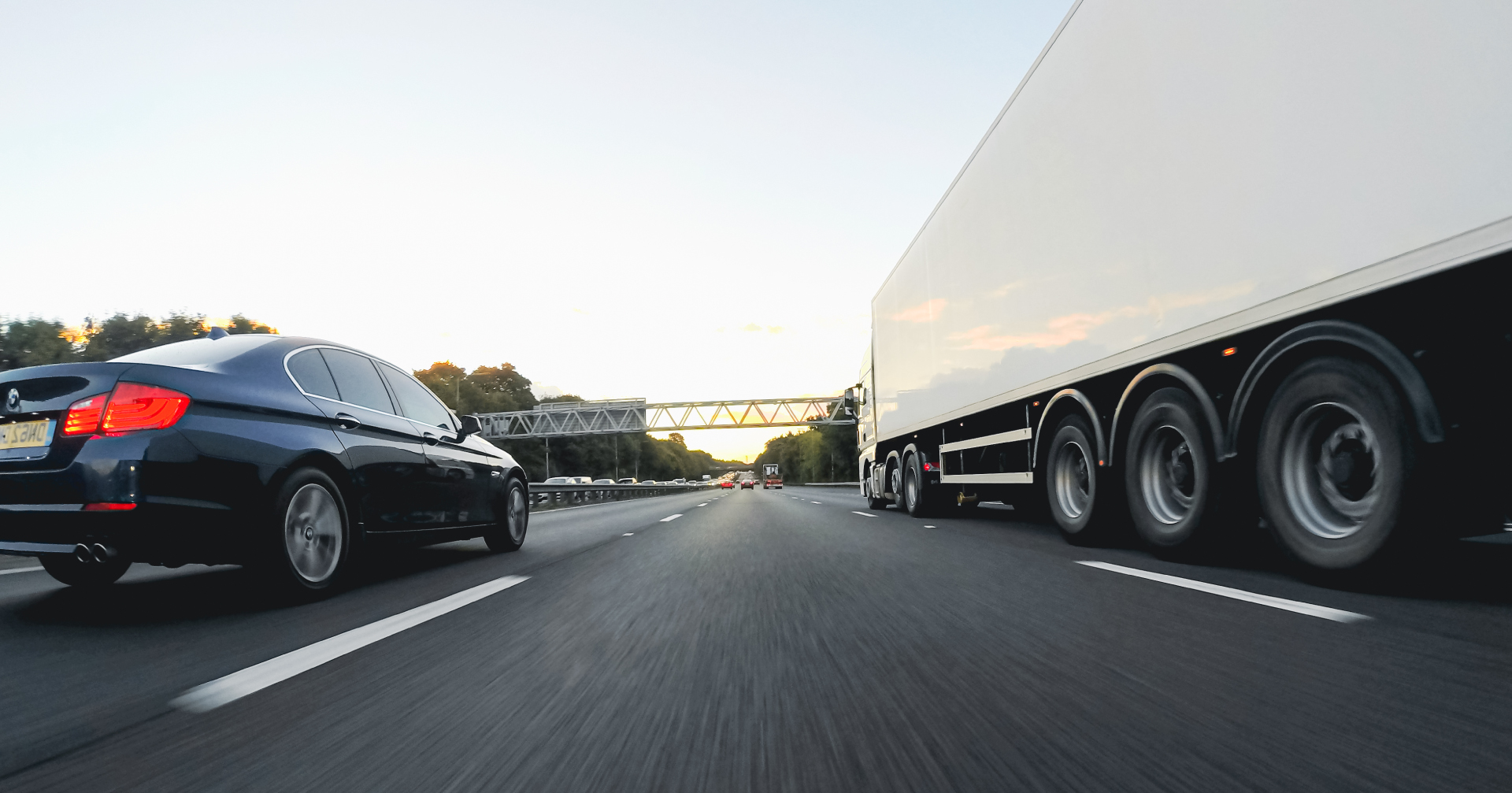 cars and lorry driving down the motorway